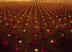 The Phra Dhammakaya temple celebrates the Buddhist holy day of Makha Bucha with a mass candle light vigil of around 100,000 monks and lay people. Wat Phra Dhammakaya was founded by Khun Yay, a Buddhist nun, in 1970 after her masters death. Her aim was to set up a temple to see the continual growth of the Dhammakaya tradition and established the temple with vision of a sanctuary for peaceful spiritual practice a refuge in the midst of a turbulent world. The temple was to become a centre for international meditation study and now has millions of members worldwide and centres from Los Angeles to London to Sydney. In the late 1990's after a string of allegations of embezzlement of millions the temple started to perform mass ceremonies which every year increased in number up to this day where it performs ordinations of 100,000 monks and mass meditation ceremonies of half a million people. HAVE RAW Redux - Lori Reese Luke Duggleby + 66 (0) 859200998
